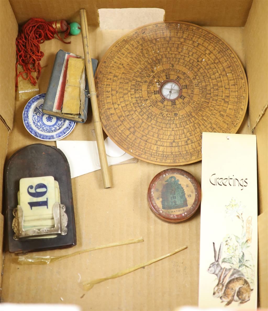 A group of Chinese and Japanese objects, 19th/20th century, including an inscribed ink box an inkstone, a lacquer bookslide, two Tibeta